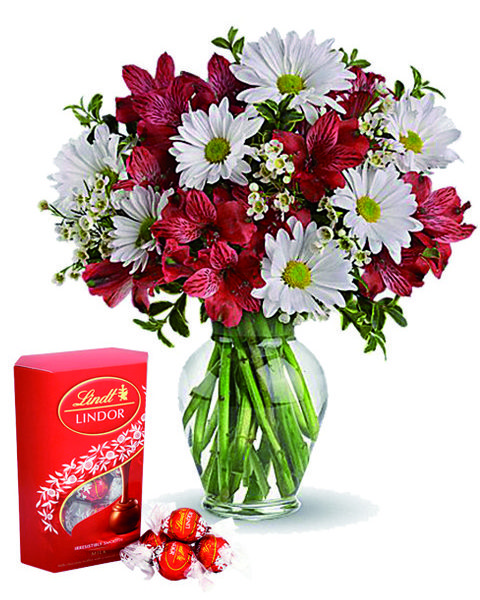 Bouquet di alstroemeria e margherite con cioccolatini a ...